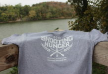 Shooting Hunger t-shirt against a river backdrop
